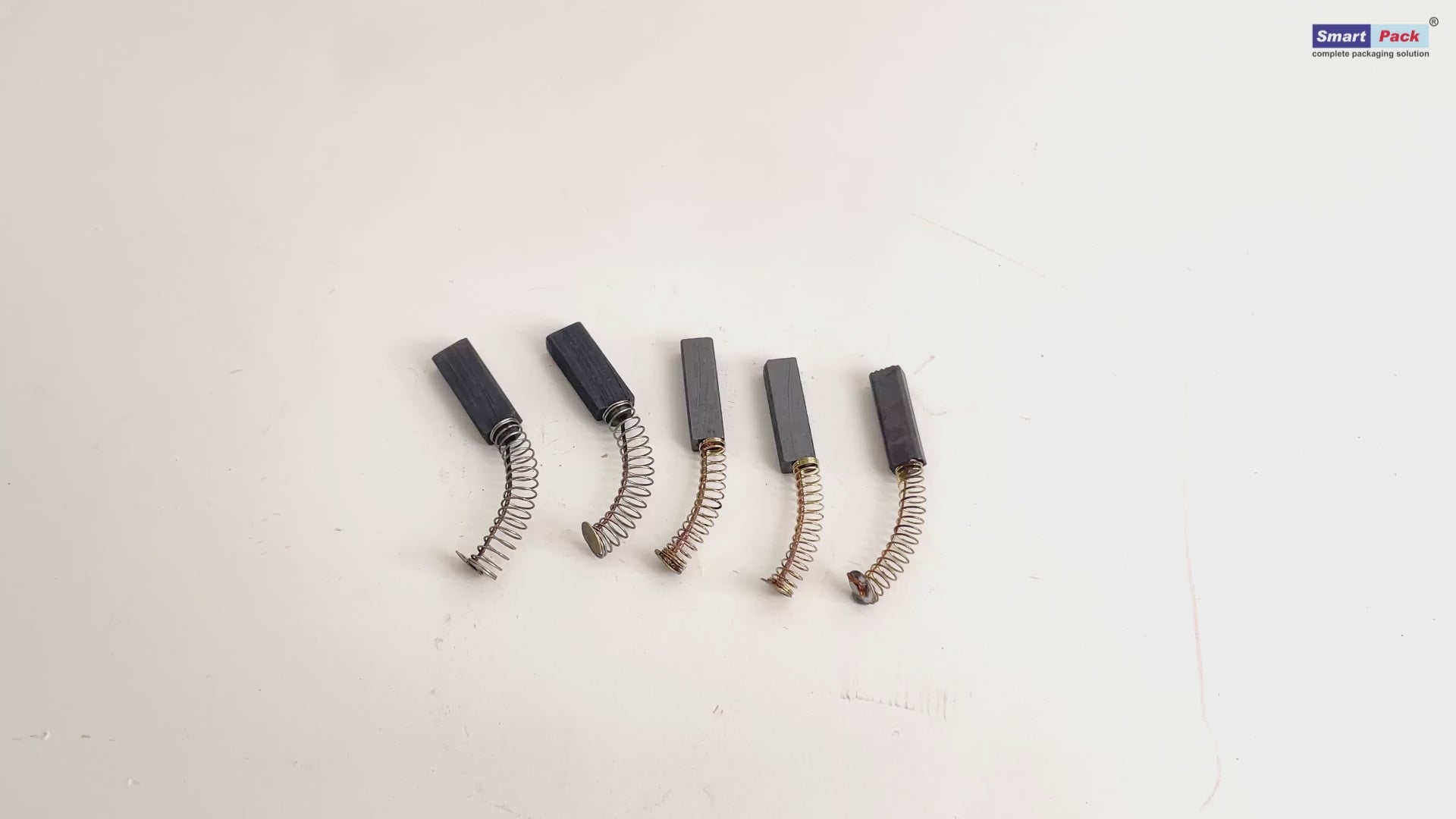 Carbon brush for high speed batch coding machine