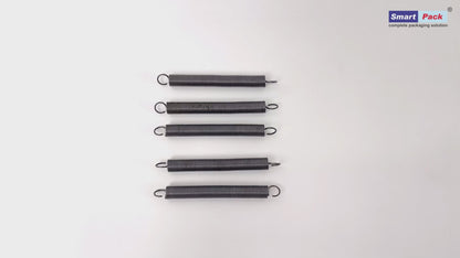 Cutter tension spring for strapping machine